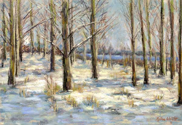 Trees with winter snow on the ground and the river Tay in the distance